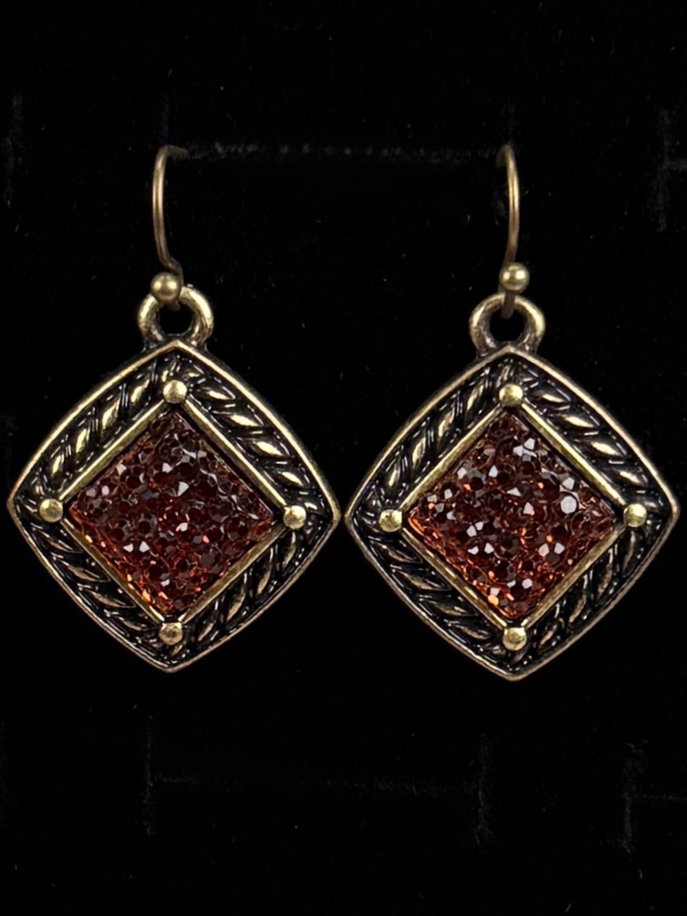Gorgeous weighted brass tone Amber colored bling costume pierced earrings